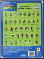 April (Yellow and Purple) from Teenage Mutant Ninja Turtles - 1992 - Basic Figures manufactured by Playmates [Back]