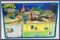 Cave Woman April (with Radical Raptor) from Teenage Mutant Ninja Turtles - Cave Turtles manufactured by Playmates [Back]