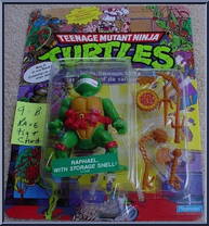 Raphael (with Storage Shell) from Teenage Mutant Ninja Turtles - Storage Shell Turtles manufactured by Playmates [Front]