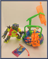 Surfer Leo with Mondo Mutant Surfer Tube from Teenage Mutant Ninja Turtles - Surfin' Ninja manufactured by Playmates [Loose]